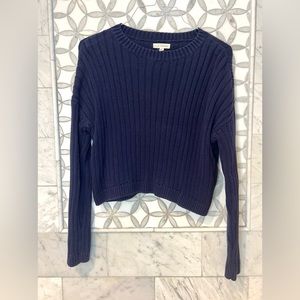Don't miss out on this adorable navy blue sweater from La Hearts!